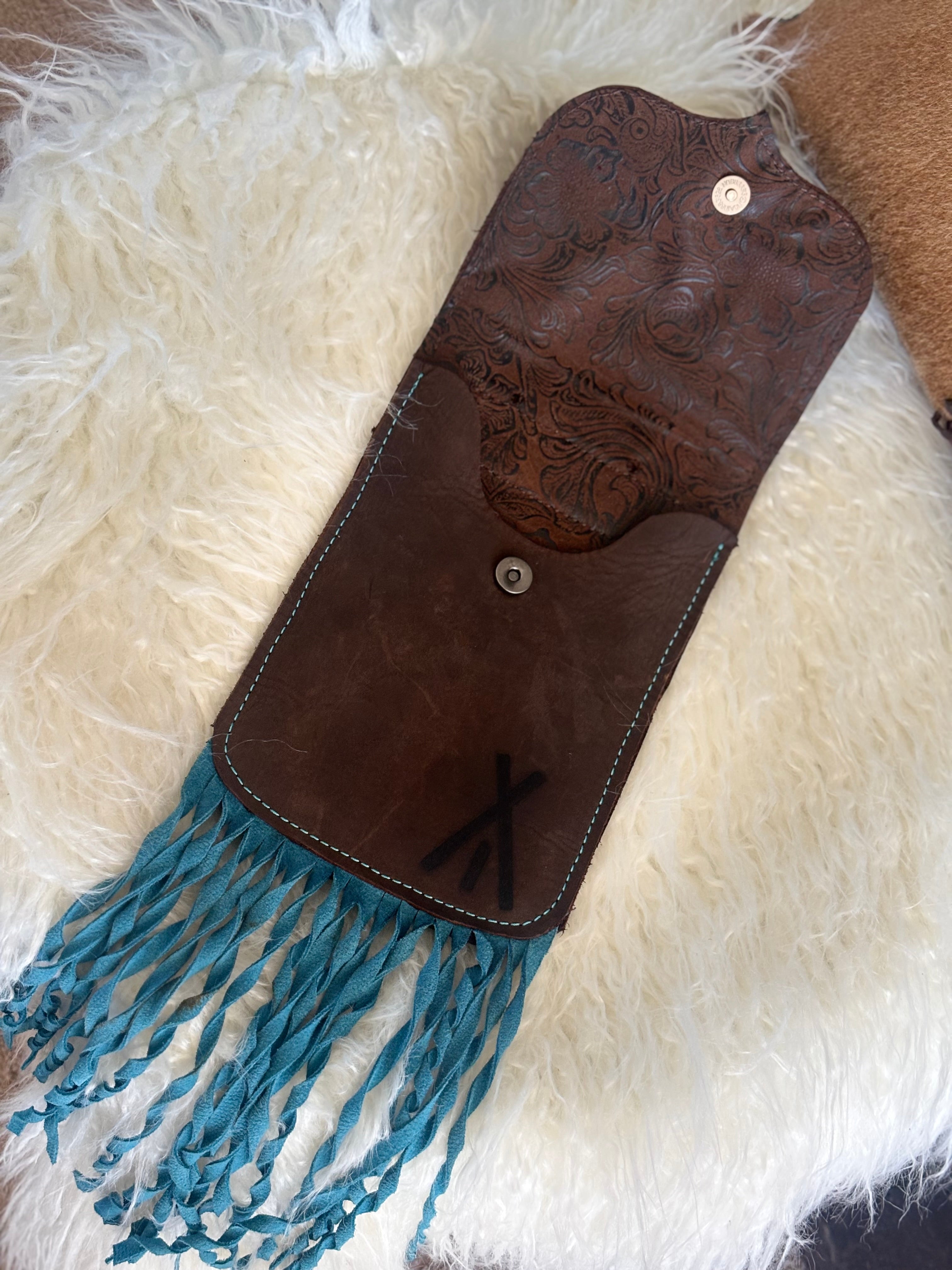 Turquoise fringe saddle sac